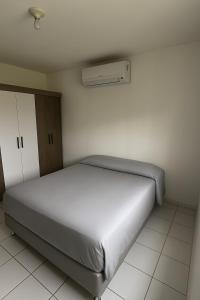 Katil atau katil-katil dalam bilik di Apartment COP30 - 20 min do evento