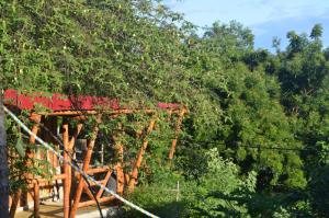 Photo de la galerie de l'établissement El Eden Glamping cabañas Girardot, à Girardot