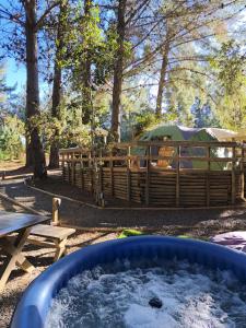 a tub of snow in front of a tent at Glamping Puertecillo Surf & Camp in Puertecillo