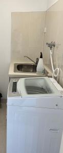 a kitchen with a sink and a counter top at Room Close Melbourne Airport in Melbourne +9 photos