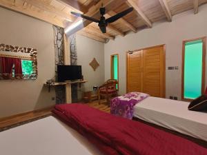 A bed or beds in a room at Das-e-Basi