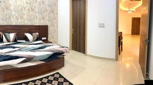 Postel nebo postele na pokoji v ubytování Bhaskar's Homestay