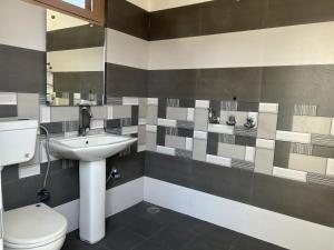 Koupelna v ubytování Bhaskar's Homestay + 15 fotografií