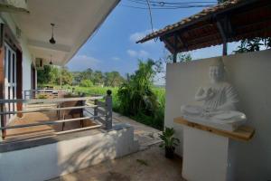 Μπαλκόνι ή βεράντα στο GR Rooms & Cottages at Candolim Goa +7 φωτογραφίες