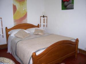 Postel nebo postele na pokoji v ubytování Auberge Cocagne
