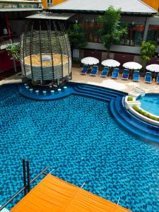 The swimming pool at or close to Red Ginger Chic Resort - SHA Extra Plus