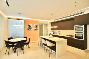 Ảnh trong thư viện ảnh của אירופה בוטיק כנרת - דירת 3 חדרי שינה עם נוף ở Tiberias