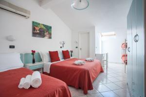 Postel nebo postele na pokoji v ubytování Hotel Giove dipendenza Hotel Fiamma