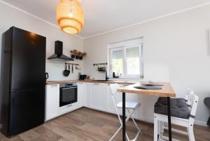 Una cocina o cocineta en Wontery Apartment near PortoNovi