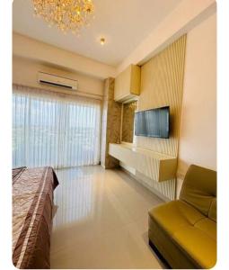 TV a/nebo společenská místnost v ubytování Studio apartment ocean breeze negombo by NB