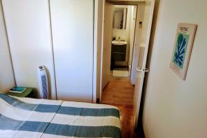 Postel nebo postele na pokoji v ubytování House with terrace and beach access on foot + 6 fotografií