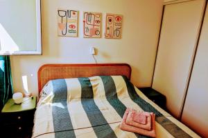 Postel nebo postele na pokoji v ubytování House with terrace and beach access on foot