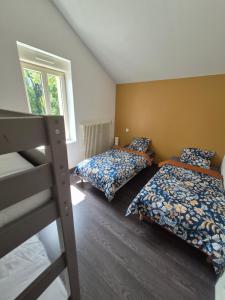 Postel nebo postele na pokoji v ubytování Maison de Gare, 8 personnes, 20 min PUY du F