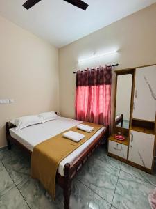 Postel nebo postele na pokoji v ubytování Kiwis Nest Homestay