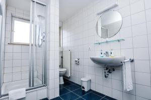 Koupelna v ubytování Hotel Garni Superior