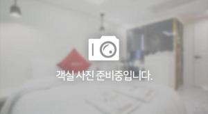 Letto o letti in una camera di Yongin Valentine