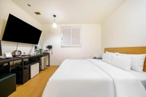 Letto o letti in una camera di Yongin Valentine