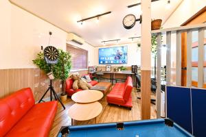 Μια τηλεόραση ή/και κέντρο ψυχαγωγίας στο Inuyama HIDAMARI 貸切一軒家4寝室 SDベッド8台 P無料