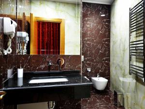 Koupelna v ubytování Hotel Austria