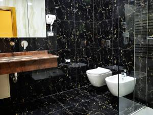 Koupelna v ubytování Hotel Austria