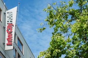 a sign for a hotel on the side of a building at IntercityHotel Stralsund in Stralsund