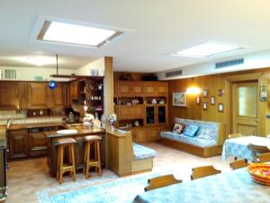 Kuchyň nebo kuchyňský kout v ubytování B&B Casa Bazzanella