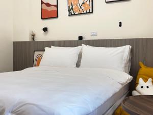 Cama o camas de una habitación en Manman Homestay