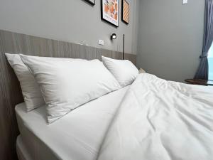 Cama o camas de una habitación en Manman Homestay