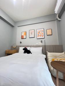 Cama o camas de una habitación en Manman Homestay