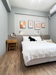 Cama o camas de una habitación en Manman Homestay