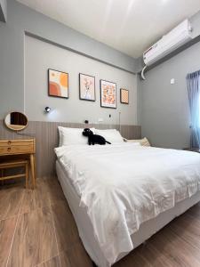 Cama o camas de una habitación en Manman Homestay