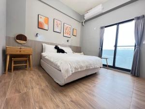 Cama o camas de una habitación en Manman Homestay