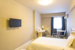 Fotografie z fotogalerie ubytování Jinjiang Inn Shiyan West Checheng Road v destinaci Shiyan + 22 fotografií