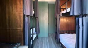 Letto o letti in una camera di Nimman Forest Hostel