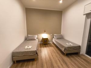 Postel nebo postele na pokoji v ubytování CasaMedì