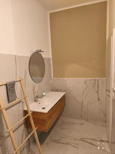 Koupelna v ubytování CasaMedì + 3 fotografie