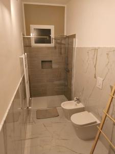 Koupelna v ubytování CasaMedì