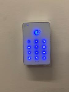an apple key board attached to a wall at L'Altalena Guest House in Lido Di Fondi