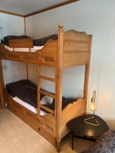 a couple of bunk beds in a room at Hafjell Alpinlandsby in Hafjell