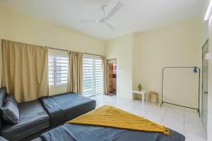Ruang duduk di The Warm Nest Golden Hill Cameron Highland Clover Home Unit 14