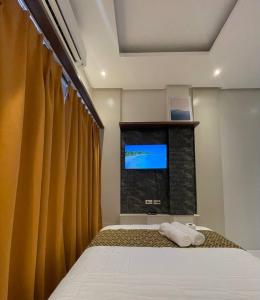 Katil atau katil-katil dalam bilik di Whitesandbar Inn