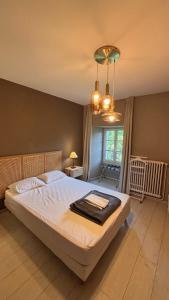 Postel nebo postele na pokoji v ubytování Château des Anges + 33 fotografií