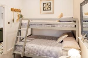 a bunk bed room with two bunk beds at The Lodge at Greenbank Farm 