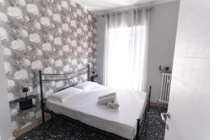 Postel nebo postele na pokoji v ubytování Balti50, lovely house in Turin