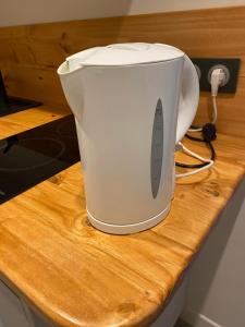a white mixer sitting on top of a counter at La maison du Gecko in Bédarrides +8 photos