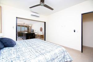 Una cama o camas en una habitación de Vista Del Arco