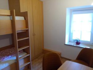 Postel nebo postele na pokoji v ubytování Ferienwohnung Kälberstall