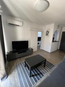 Posezení v ubytování One bedroom apartment in Paphos in good location