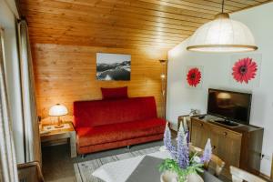 Телевизор и/или развлекательный центр в Almblick Appartements