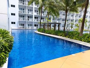 Bazén v ubytování Condo unit on SMDC shore nebo v jeho okolí + 4 fotografie